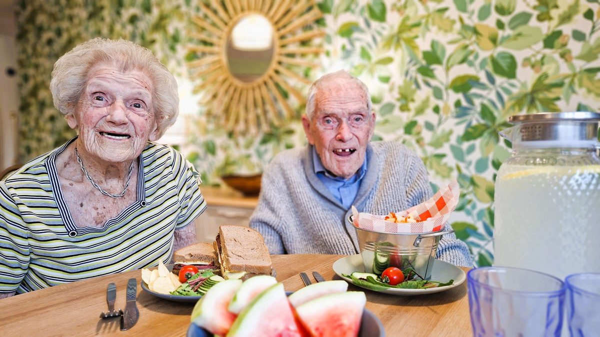Residents enjoying a meal together